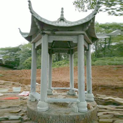 村口擺放青石六角涼亭景觀(guān)石雕