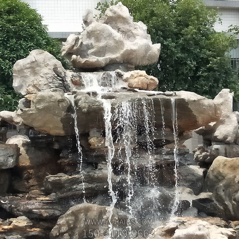 公園景區石雕流水的太湖石雕塑